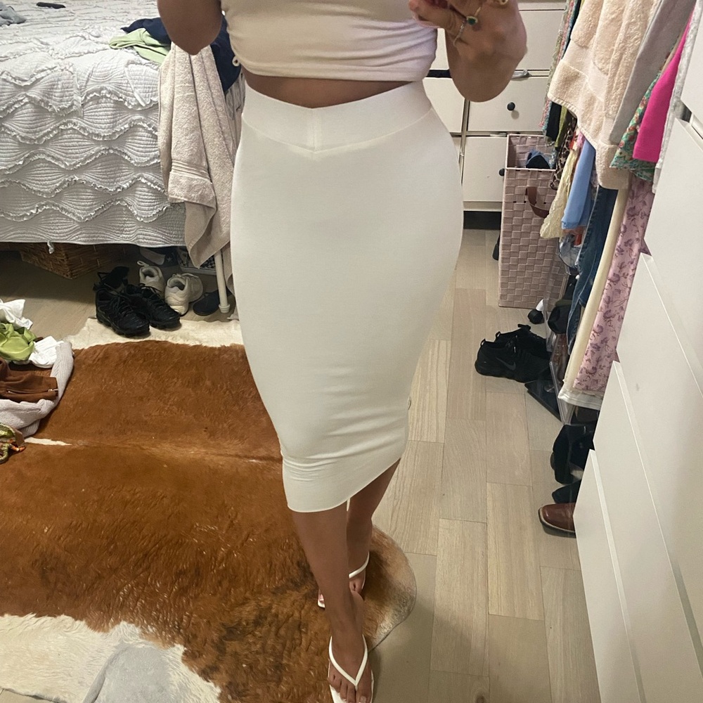 White skirt with front V